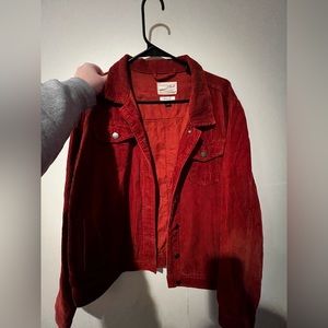 Loose fit corduroy jacket in burnt orange (appears more red in the photo).